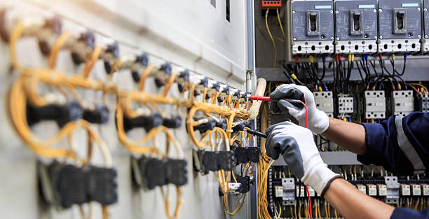 Professional Electrician technician working in Honeoye Falls, NY